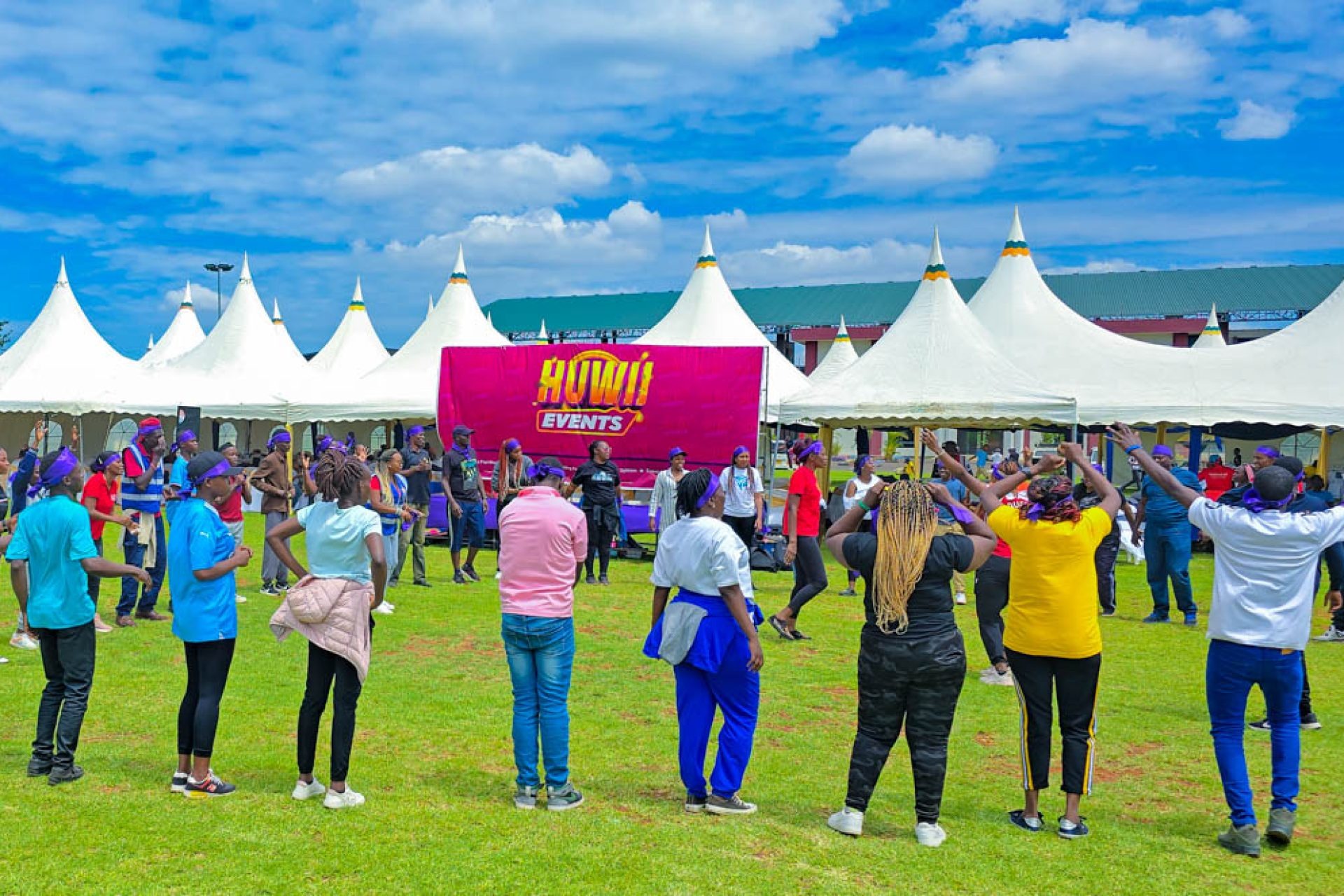 Large crowd taking part in a Huwii Events team building session