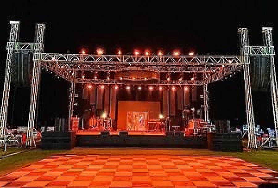 Stage and truss rigging at an outdoor event